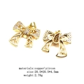 Detailed view of gold bow pendant made of copper and zircon with dimensions 20.5mm - Bow (1)