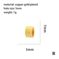 Macro shot of gold plated copper bead with 5mm hole size for jewelry making - Cylindrical Textured Bead / Gold