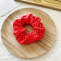 Elastic red hair scrunchie with white polka dots pattern on wooden tray - Red with White Dots