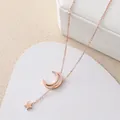 Elegante roségoldene Kette mit Mond- und Sternanhänger aus hochwertigem Titanstahl - Stahlfarbe