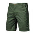 Detail van donkergroene katoenen short met elastische tailleband en twill textuur - EU 30 / Groen