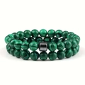 Set di bracciali in malachite verde con pietra nera quadrata su sfondo bianco - Pietra pavone verde