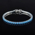 Macro shot of silver tennis bracelet with round cut light blue zircons on black background - 3mm-17cm / Sky Blue Zirconia