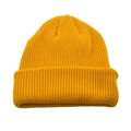 Detail of ginger yellow ribbed knit beanie showing thick wool texture and folded cuff edge - Yellow