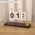 Minimalist wooden flip calendar with gold metal frame and black KAWS-style bear figure - Metal Bear-Black Base