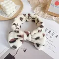 Plush leopard print headband with bow in cream and brown for makeup and face wash - Beige Brown Leopard