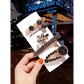 Detail of luxury 4-piece hair clip set with sparkling rhinestones and elegant pearls - Pearl Flower Hair Clip