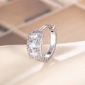 Boucle d'oreille géométrique en argent avec micro-sertissage de zircones cubiques - Blanc (Pièce Unique)