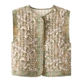 Close-up of bohemian floral print and quilted texture on women's vest jacket - S / Tops / Green Floral