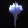 Hanging glowing Halloween ghost with white LED lights and smiling face on wood background - White Light-Glowing Ghost