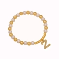 Beaded bracelet featuring white pearls, gold beads, and a crystal letter Z pendant - Letter Z