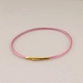 Pink stainless steel wire bracelet with a golden press clasp in a minimalist style - Pink Rope Gold Clasp