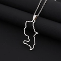 Macro detail of Martinique map pendant necklace in polished silver stainless steel - Steel Hollow