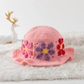 Pink handmade crochet bucket hat with 3D floral patterns on a soft white background - One Size / Multicolor Daisy Pink Base