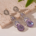 Detailed view of silver drop earrings with large purple crystals and sparkling diamonds - Silver Needle - Purple Water Drop Earrings