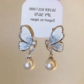 Detail of silver butterfly earrings with sparkling crystals and hanging round white pearls - 6# Blue Half Butterfly Pearl Drop Earrings