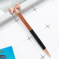 Rose gold bow metal ballpoint pen with gold glitter and elegant black barrel - Black (Rose Gold)