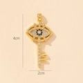Golden Evil Eye key pendant with blue stones and 4cm x 2cm size dimensions - Gold Key Shape Evil Eye Pendant (41)