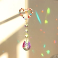 Rainbow crystal suncatcher with heart wire frame and sparkling drop pendants for home decor - Multicolor Heart