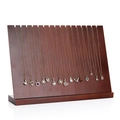Dark brown wooden necklace display stand featuring various gold pendant necklaces - Red Brown