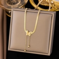 Gold butterfly necklace with beads tassel and flat snake chain on a brown jewelry box - Butterfly Tassel Bead (AH6081) / Gold