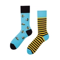 Detail view of cotton crew socks featuring mismatched bee patterns and yellow stripes - Striped Bee