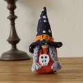 Halloween gnome with star patterns hat and skull pendant on wooden surface - Braid Style B