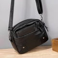 Minimalist black PU leather crossbody bag with multiple zipper pockets and adjustable strap - Black