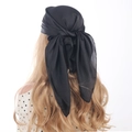 Elegant black satin square silk scarf worn as a headpiece for a minimalist feminine look - 70cm x 70cm / Black