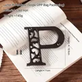 Industrial cast iron letter P wall decor with vintage patterns and mounting screws - Letter P