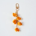 Realistic PVC popcorn keychain with five detailed golden kernels and lobster clasp - Caramel Popcorn (5 Pcs)