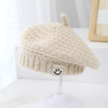 Detail of beige chunky knit beret showing smiley face patch and thick wool texture - 1-3 Years / Beige