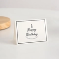 Carte d'anniversaire pliée blanche minimaliste avec lettrage noir élégant et bougie - Joyeux anniversaire