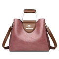 Deep pink PU leather tote bag with brown handles and a gold metal kangaroo logo - Purple