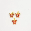 Detailed view of three golden butterfly pendants with red-orange micro-pave cubic zirconia - Pendant Only / Orange Red