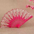 Pink folding fan with golden lace pattern and decorative floral accent on beige fabric - Standard Type / Rose Red