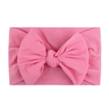 Soft pink nylon headband with a large bow for baby girls and infants - Medium Pink