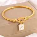 Goldenes Armband in Kordeloptik mit Schütze-Sternzeichen-Anhänger und Hufeisenverschluss - Gold Schütze