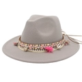 Detail of gray wool fedora hat featuring bohemian tassel band and natural shell accents - Light Gray