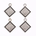 Close-up of four silver diamond square pendants for DIY jewelry and earrings - Silver Square