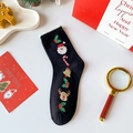 Calcetines negros de Navidad con bordados festivos y puño de forro polar blanco - Talla única / Negro
