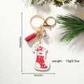 Christmas stocking keychain with tassel and sequin glass ball on festive pine branch - Christmas Sock Style 1