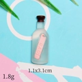 Detailed view of ocean style resin bottle charm with love scroll for DIY crafts - Transparent Drifting Bottle