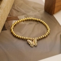 Elegant gold beaded bracelet featuring a sparkling zircon butterfly pendant in a chic style - Single Butterfly Style