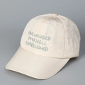 Detail view of cream quick-dry baseball cap featuring blue UNCHANGED 1998 embroidery - M(56-58cm) / Off White