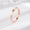 Rose gold stainless steel ring with Roman numeral engravings in a minimalist style - US 4 / Rose Gold