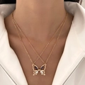 Zweilagige goldene Halskette mit Schmetterlingsanhänger und violetten Kristallen - Schmetterling Gold (M-696)