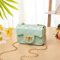 Mini mint green jelly crossbody bag with diamond quilted pattern and gold chain strap - Light Green