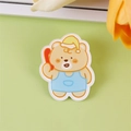 Cute cream bear acrylic brooch wearing blue overalls and a yellow sleeping cap - Phone Calling Bear