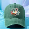 Close-up of the vintage washed dark green cotton baseball cap with MAMA floral embroidery - One Size / Dark Green